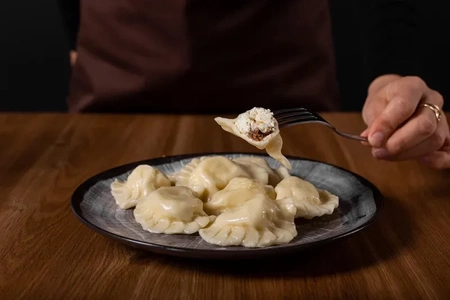 Pierogi serniczkowe ze skórką pomarańczową i rodzynkami (450 g)